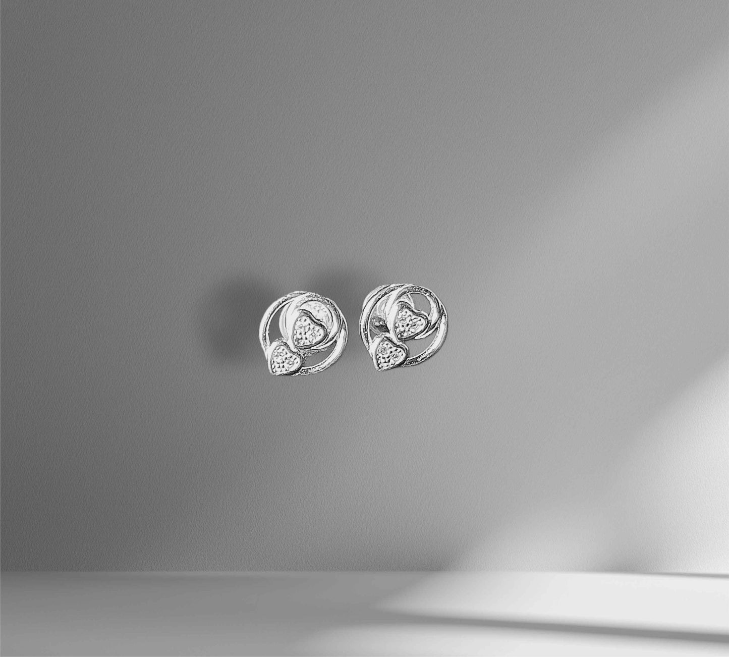 Elegant Silver Heart Stud Earrings for Women | Sterling Silver Jewellery Silvergift.in