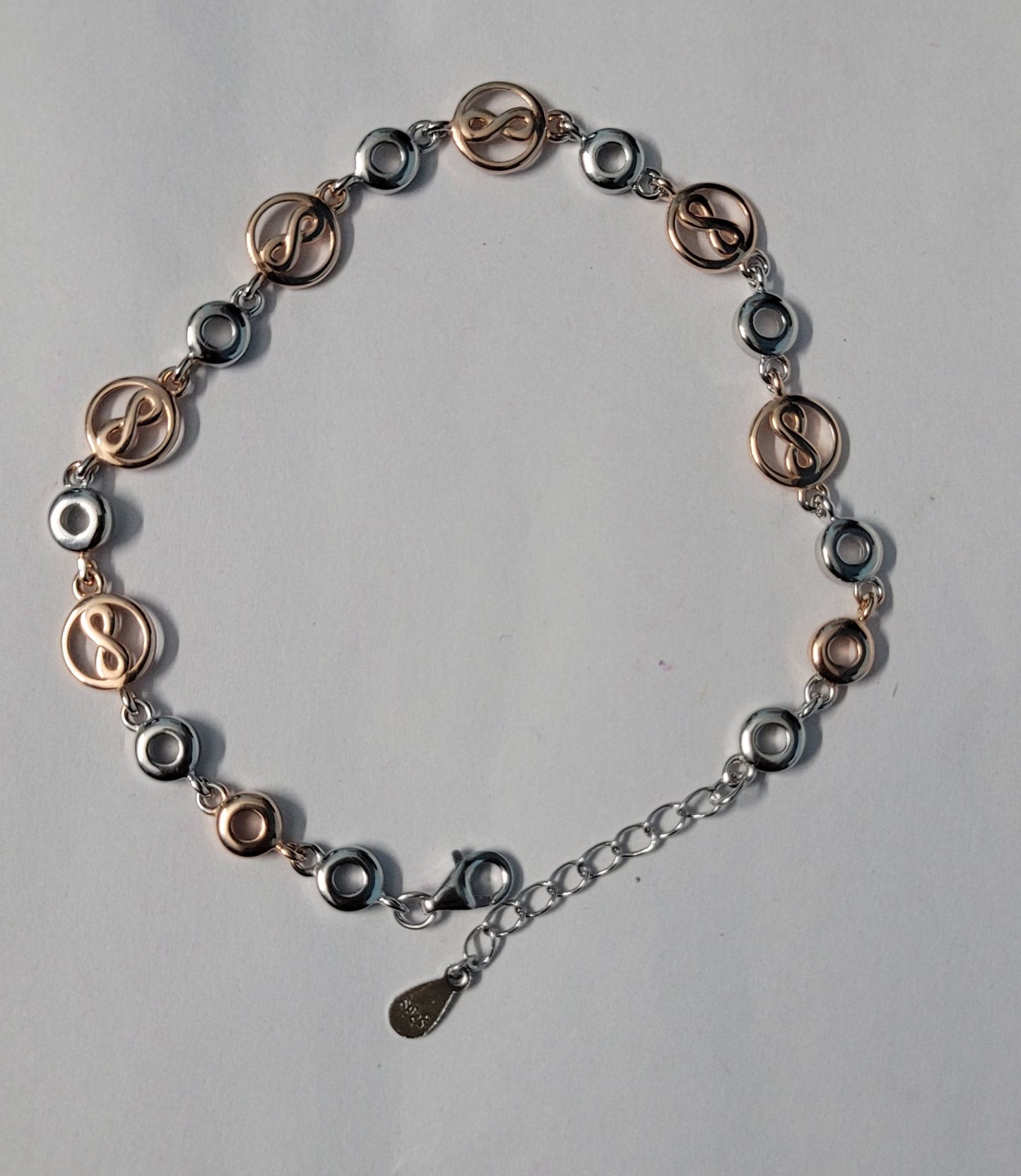 Dual Tone Infinity Bracelet in Silver & Rose Gold for Women – Stylish Adjustable Designer Jewelry Gift, Trendy Fashion Accessory. Silvergift.in