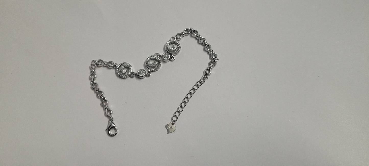 Trendy Spiral Party Wear Bracelet – Stunning Silver Designer Jewelry for Women & Girls. Silvergift.in