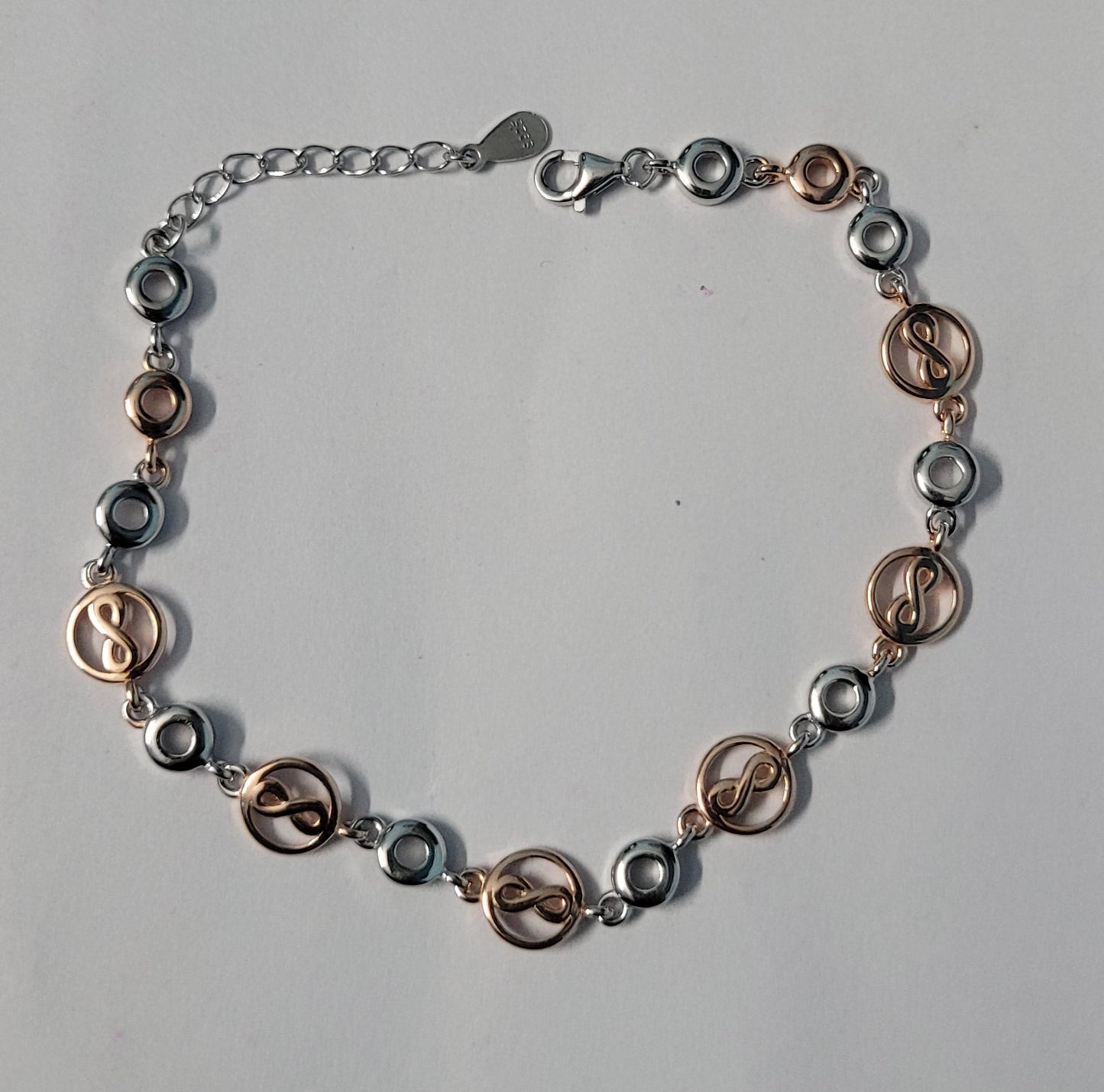 Dual Tone Infinity Bracelet in Silver & Rose Gold for Women – Stylish Adjustable Designer Jewelry Gift, Trendy Fashion Accessory. Silvergift.in